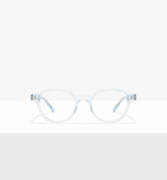 Person with glasses and a halter top against a yellow background.