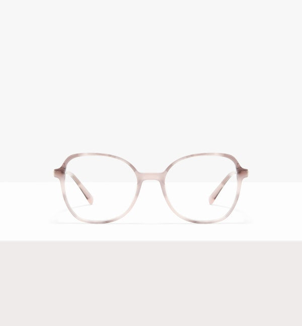 Oval-shaped eyeglasses with a light, translucent frame on a white background.